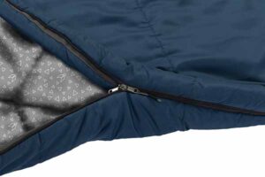 0428039N_3 Saccoletto Starflyer XL arrotolato e riposto nella sua sacca di compressione, pronto per il trasporto.